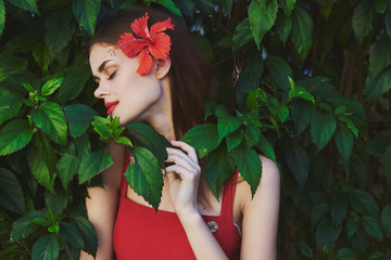 portrait of beautiful girl with perfect skin looking at camera