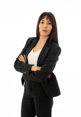 Portrait of a serious confident business woman looking straight. Isolated on white background