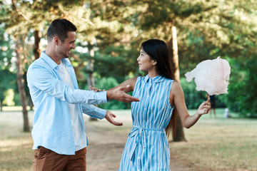 young couple walking in the park