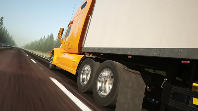 Semi truck with trailer driving through the green forest during sunny day. 4K