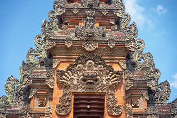 Entrance to the temple. Vastly decorated and unique gates to the entrance of temple. Bali, Ubud.