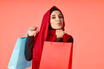 young woman with shopping bags