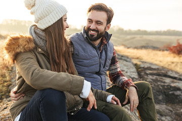 Amazing emotional happy young loving couple outside in free alternative vacation camping over mountains.