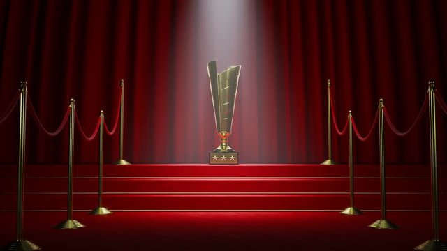 Golden movie award standing in a spotlight on the red carpet stairs. 4KHD