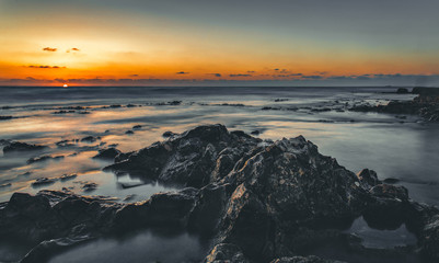 Sea landscape with sand, sky and clouds background.
