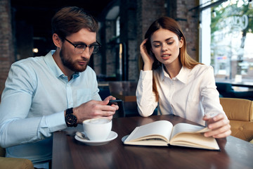 young couple in cafe
