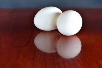  Two white eggs Placed on the table
