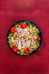 cereal specialties cooked with salad, roasted chicken aiguillette cured with salted and bacon