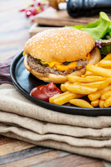 Cheese burger - American cheese burger with Golden French fries