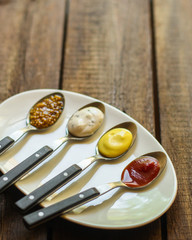 sauces, portion serving (ingredient). Top view. copy space