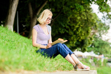interesting story. Relax and get new information. student girl with book outdoor. woman in park...