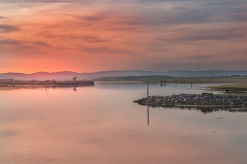 Sunset over Irvine Harbour in Ayrshire Scotland looking over to Ardeer Peninsula on a Clam Summers Evening in Scotland