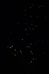 Loi Krathong and Yi Peng released paper lanterns on the sky during night