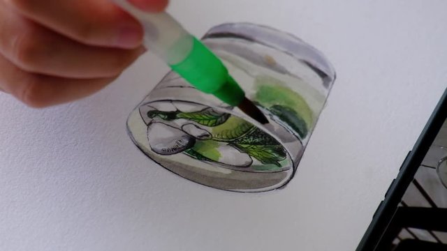 Painter finishing her reproduction of a mojito glass, close up