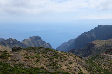 Green mountain cliffs with sea on the background (Tenerife - SPAIN)