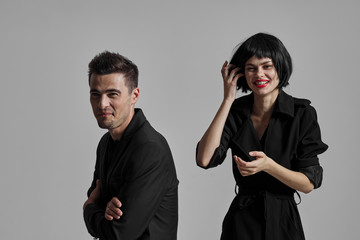 man and woman fighting over white background