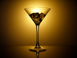 empty martini glass on black background