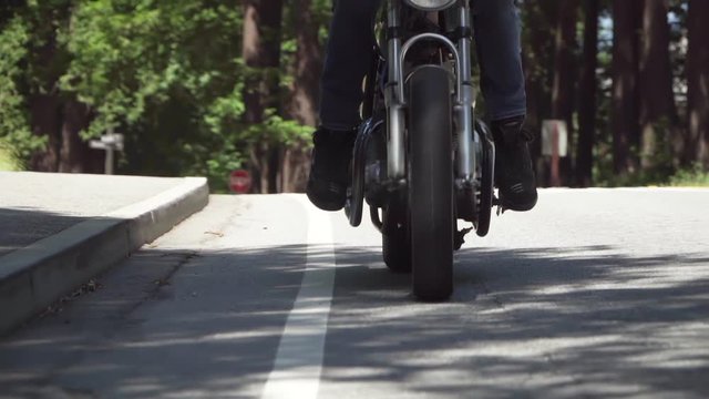 Slow Motion Close Up of Motorcycle Wheel Slowing Down