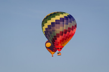 HOLIDAY ADVENTURES - Flight of balloons on a blue sky