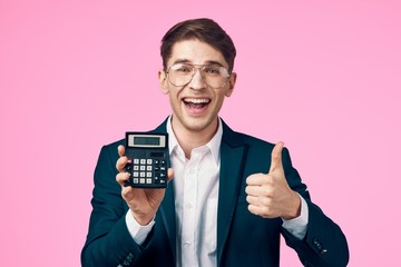 young business man with calculator - obrazy, fototapety, plakaty