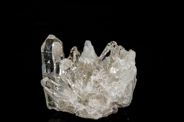 Macro mineral stone rhinestone, rock crystal on a black background