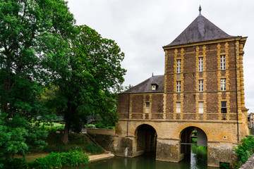 building of old water mill along river Meuse. Charleville Mezieres, France