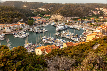Bonifacio in Corsica, harbor with boats. Mediterranean France.