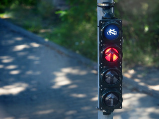 Germany, traffic light. City life in sunny day, street, traffic light for cyclists