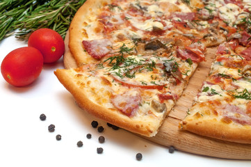 Fresh tomato, mushroom, cheese and sausage pizza on a round board isolated on white