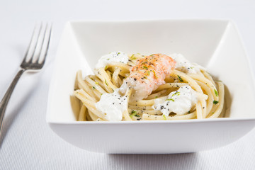 Italian spaghetti with scampi and burrata