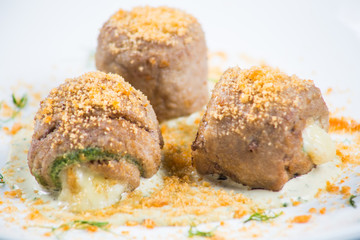 Meat rolls stuffed with cheese