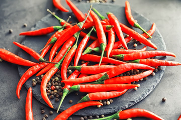 Hot red pepper. Chilean pepper on a black.