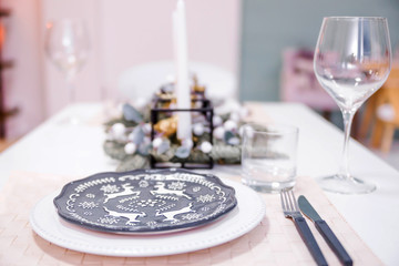 decorative plate with painted deer as part of the New Year's serving