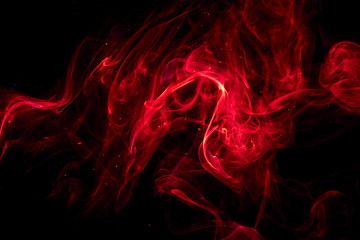 Red smoke on black background