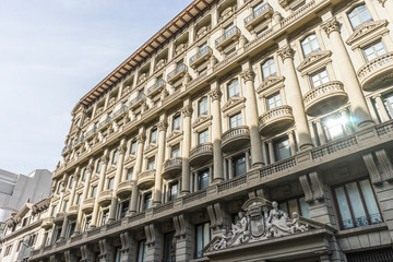 Naklejka premium balconies with Corinthian style columns, Facades and traditional architecture in the old town of Barcelona, Spain