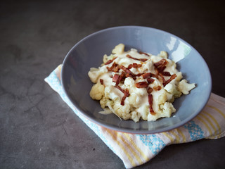 Healthy ketogenic paleo cauliflower alternative to traditional potato dumplings with bryndza cheese and bacon