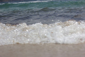 close up the waves seeks the beach