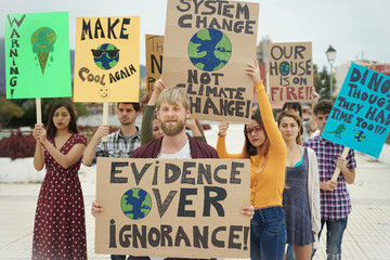 People protesting against multicultural opinion. Young people from diferent countries showing their...