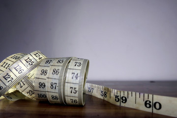 old tailor measuring tape