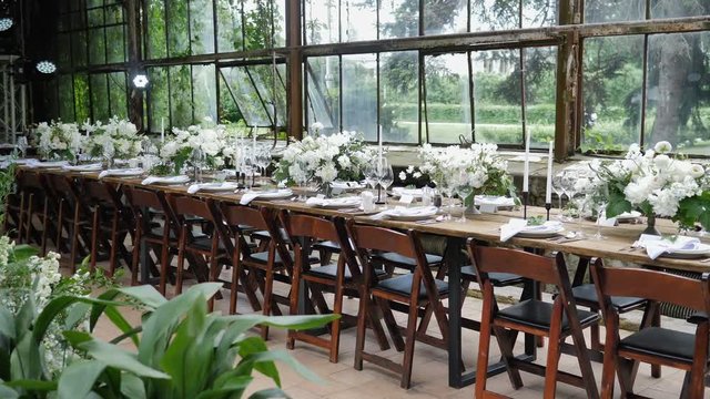 Beautiful Wooden Table Decoration for a Wedding Dinner in Rustic Style