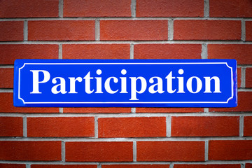 Participation street sign Experience street sign on brick wall