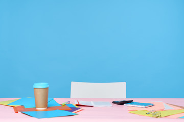 cup of coffee and books on wooden table