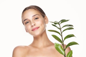 portrait of young woman with flower