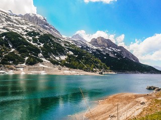 Lago Fedaia (Fedaia lake), an artificial lake and a dam near Canazei, located at the foot of Marmolada massif, Dolomites, Italy