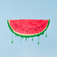 Watermelon slice melting. Minimal summer concept background.