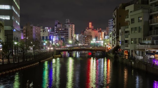 Tokyo Night river cityscape with bridge Japan time lapse
