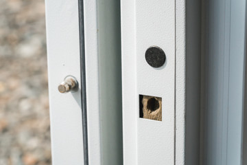 The photo of the white metal strengthened door