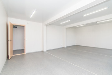Light white empty office room with bright lighting