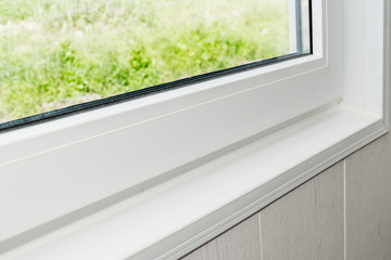 Established new white window sill indoors