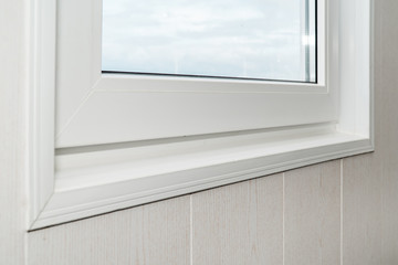 Established new white window sill indoors